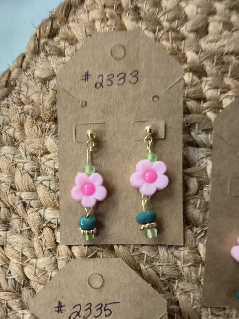Pink Flower Dangle Earrings with Green Accents